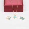 CDD nuevo color Trébol conjunto de tres piezas collar de mariposa de doble cara pendientes de botón anillo traje femenino comercio exterior en stock al por mayor