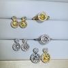 Explosiones de aguja plateada bolsa de oro de 18 quilates microincrustación de circonita pendientes de triángulo collar anillo soporte vacío pendientes DIY accesorios de perlas