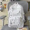 Mochila linda de niña con estrellas estampadas por todas partes, adecuada para estudiantes de secundaria y preparatoria, elegante y ligera