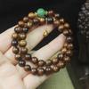 Pulsera de doble anillo de palo de rosa negro de 8 mm Colgante de campana para hombre y mujer Wenwan cuentas de Buda rosario venta al por mayor de fábrica