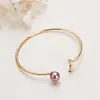 Joyas de Perlas al por Mayor Redondas Edison Concha Cola de Pez Cobre Chapado en Oro Zhuji Pulsera Pulsera Pulsera de Perlas de Agua Dulce