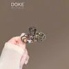 Exquisita horquilla con lazo de cristal para mujer, nuevo estilo, elegante, pequeña pinza para sujetar la parte posterior de la cabeza, pinza de tiburón para la mitad del cabello, tocado de alta gama