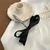 Corea del Sur nuevo negro retro sentido de alta gama perla lazo horquilla niña pequeño viento fragante accesorios para el cabello al por mayor