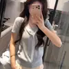 Chal de imitación de dos piezas estilo francés, top de punto azul de seda de hielo de manga corta para mujer, diseño de verano, top corto ajustado de nicho