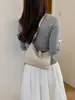 Bolsa de antebraço feminina 2026 nova moda outono bolsa de ombro versátil com toque de luxo para trabalho e deslocamento, bolsa tiracolo tipo balde