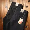Pantalones Nuevos de Hombre Otoño e Invierno 2024 Cálidos de Algodón Derretido Gruesos Versátiles Sin Planchar para Hombres de Mediana Edad Rectos Holgados Casual de Negocios
