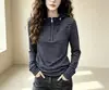 Sudadera con capucha a rayas de moda para mujer, nueva de otoño, elegante, reduce la edad, holgada, adelgazante, con media cremallera, top base
