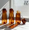 Servicio de Pedidos Jinze: Tapones de Bola para Tubo Redondo, Aplicadores de Pincel Fino/Grueso, Envases de Brillo de Labios de Forma Irregular, Materiales de Empaque de Plástico