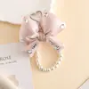 Nuevo Collar de Perlas Lazo Diamante Brillante Tridimensional Relleno Colorido Colgante para Teléfono Móvil Bolso de Nicho Colgante para Llaves
