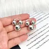 Pendientes de Bola Metálicos Brillantes Personalizados de Tendencia Transfronterizos para Mujer Moda Simple Geométricos de Gama Alta Pendientes en Forma de U Pendientes