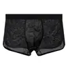 Ropa interior de malla de color liso de seda de hielo para hombre Huajielong al por mayor, boxers transpirables de cintura media para hombre, disponibles para dropshipping