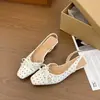 Sandalias Chuyuji estilo francés exquisitas de punta cerrada para mujer, nuevo modelo de verano 2026, zapatos sin talón de una tira para combinar con faldas, estampado de lunares