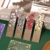 Marcador de página metálico oco, novo design com motivos de plantas e florais, alto valor estético, estilo antigo, borlas requintadas, clipe de página para leitura de estudante, material de papelaria