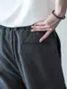 Pantalones casuales para hombre de lana con textura de espiga y cintura semi-elástica, colección otoño 2026, estilo de pierna recta con una estética "old money"
