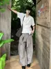 Pantalones de pierna ancha acampanados a rayas transfronterizos, adecuados para primavera y otoño, con una textura fluida y sedosa, disponibles en tres colores, perfectos para ir al trabajo y crear un estilo relajado de 'viejo dinero'.