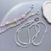 Lanyard para Teléfono Móvil Cruzado de 1.2 m Largo Cruzado para Llevar en la Espalda Ins Pequeña Flor Colgante de Perlas Funda para Teléfono Móvil Universal Anti-Bolsas