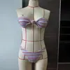 Bikini bandeau sexy con estampado de ondas estilo europeo y americano 2026, nuevo traje de baño de dos piezas de triángulo de cintura alta para mujer