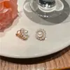 Nuevos pendientes de botón de flor de perla 2023 para mujer, aguja de plata 925, incrustaciones de diamante, diseño de nicho, joyería de clip para oreja de alta calidad, moda