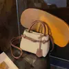 Bolso de mano pequeño súper popular transfronterizo para mujer, nuevo bolso de hombro de moda de otoño 2026, bolso bandolera tipo cubo para el día a día
