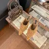 Pantuflas de exterior para mujer Baotou 2026 otoño e invierno nuevo estilo mules peludos de tacón grueso estilo francés