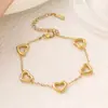 Placa de Acero Inoxidable Baño de Oro 18K Moda Versátil Hueco Corazón Tridimensional Conjunto de Pulsera Collar Pendientes Venta al por Mayor en Stock