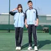 Fábrica de uniformes escolares al por mayor traje deportivo de primavera para estudiantes de primaria y secundaria ropa de jardín de infantes ropa de clase moda primavera y otoño