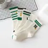 Calcetines de algodón para mujer de otoño e invierno de 168 pines con letras N cara sonriente calcetines para mujer desodorantes absorbentes de sudor calcetines cortos suelas elásticas de moda