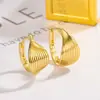 Arete de oreja con textura de giro de círculo geométrico para mujer, estilo frío minimalista, aro de oreja liso, exquisito, sensación de alta gama, tendencia popular