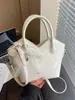 Bolso de Hombro de Moda Primavera 2026 Transfronterizo, Bolso de Mano con Diseño de Nicho Conveniente, Bolso Cruzado para Mujer Moderno y Elegante