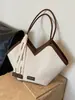 Bolsa de Ombro Versátil Tecida Retrô Transfronteiriça para Mulheres 2025 Nova Moda Casual Bolsa de Ombro Cor Contrastante Bolsa Tote para o Dia a Dia