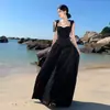 Conjunto de Dos Piezas: Top Tubo Negro + Falda Larga Acampanada de Cintura Alta para Vacaciones en la Playa, Verano, Adelgazante y Elegante
