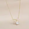 Cadena para Clavícula Elegante de Zirconia Bañada en Oro Real Diseño de Nicho Femenino Collar con Lazo Cadena de Lana Personalizada Versátil