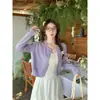 Suéter cárdigan amarillo para mujer, estilo nuevo de principios de otoño 2026, combinado con una chaqueta tipo camisola, top de punto de alta gama para otoño
