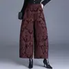 Calças elásticas de cintura alta com perna curva 2026, da nova coleção de outono/inverno da moda, calças de perna larga em jacquard, caimento solto, com estampa floral, calças casuais