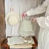 Conjunto elegante para niña estilo coreano de principios de otoño, nueva camisa básica floral para primavera y otoño + camisola con inserciones de malla