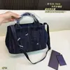 Bolsa de mão vintage de alta qualidade em jeans, grande capacidade, design simples e versátil para férias e trabalho, pode ser usada como bolsa transversal ou de ombro para a praia
