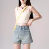 Shorts de mezclilla de tiro alto con bolsillos, diseño acampanado elegante, efecto adelgazante, para mujer, verano 2026, versátiles y de corte holgado para figuras petite