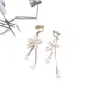 Pendientes de Flor Nueva de 25 Años Pendientes Largos con Borla de Perla Mismo Estilo que las Celebridades de Internet Japonesas y Coreanas Gancho de Oreja Femenino Clip para Oreja