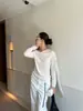 Top de Hombros Descubiertos Estilo Francés Wanwei para Mujer 2026 Otoño Nuevo Una Pieza Transparente Cinta Hombro Asimétrico Camisa Base Y7010