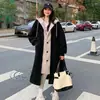 Corea del Sur chic otoño e invierno Nuevo abrigo falda con capucha larga lana de cordero falso dos piezas holgado moda abrigo moda mujer