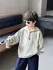 Sudadera unisex con capucha Q088 para niños y niñas, casual y de corte holgado, estilo nuevo con estampado de estrella de cinco puntas, adecuada para primavera y otoño