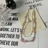 Collar de Doble Capa con Perlas Frescas y Piedras Irregulares de Colores Dulce Temperamento Femenino Cadena para Clavícula de Gama Alta Nicho de Moda
