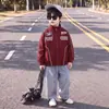 Chaqueta de motocicleta para niños, estilo fino de otoño, cortavientos nuevo para niños 2026, chaqueta de primavera/otoño moderna y genial para niños