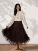 Falda asimétrica de retazos de encaje de diseñador Feiyuan para mujer, nueva para principios de otoño, de cintura alta, adelgazante, color liso, línea A, falda de malla
