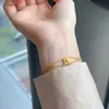 Estilo Xiaohongshu Exclusivo e Delicado Série Anos Dourados Pulseira de Folha em Espiral Barroca Pulseira de Luxo Pulseira de Estilo Antigo
