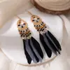 [Selección Premium] Pendientes Largos con Borlas Tejidas de Plumas Estilo Étnico Vintage para Mujer Pendientes Huecos de Gama Alta Bohemios