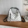 Bolsa de lona estilo retro artístico de lunares estilo universitario coreano para mujer, nuevo modelo de verano 2026, bolsa de doble hombro y un solo hombro de gran capacidad