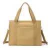 Bolso de Mujer 2025 Invierno Nuevo Estilo Bolso de Hombro Urbano Simple Gran Capacidad Ligero Bolsa de Nailon Bolso de Mano Casual Bolso Cruzado