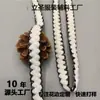 Renda de espinha de peixe ondulada bilateral de seda dourada, renda tecida à máquina de crochê estilo Xiaoxiangfeng, acessórios de vestuário em estoque, atacado