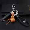 Doce Signos del Zodiaco Calabaza de Madera de Durazno con Llavero de Barra de Oro Hebilla de Cinturón de Cuero Colgante de la Suerte Zodiacal Regalo de Negocios